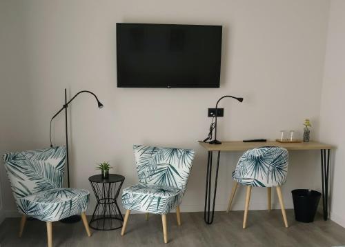 TV a/nebo společenská místnost v ubytování B & B De Veurnse Slaper