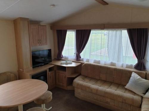 Un lugar para sentarse en Glamping Heidekamp