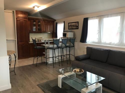 Een zitgedeelte bij Relax Apartmenthouse