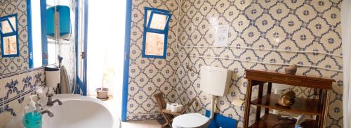 a bathroom with a sink and a toilet at RIA Terrace in Faro