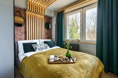 Posteľ alebo postele v izbe v ubytovaní Apartament Alicja, ścisłe centrum, Orkana 3