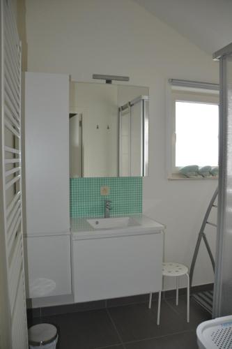 Ett badrum på Maison Maritime