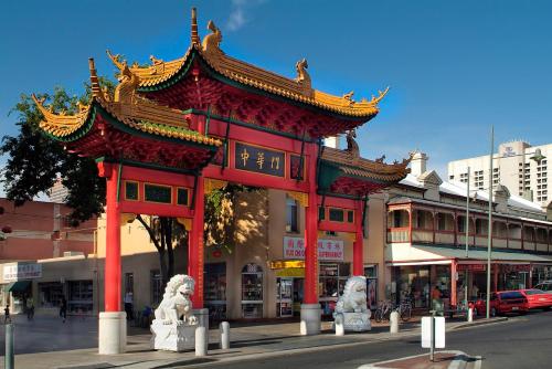 a building with a pagoda on the side of a street at Horizons 1402 - Free carpark in Adelaide