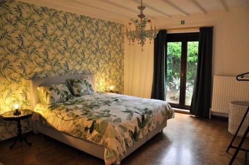 Un pat sau paturi într-o cameră la Spelver95