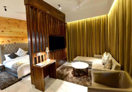 Posezení v ubytování Kasauli Hills Resort