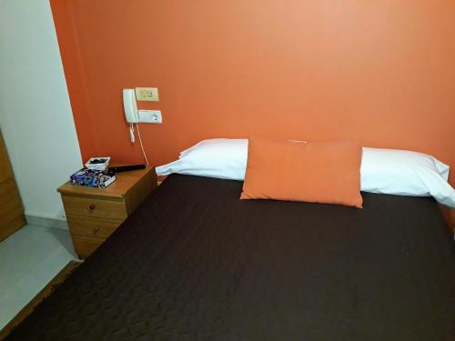 Ένα ή περισσότερα κρεβάτια σε δωμάτιο στο Porta Nova Apartamentos