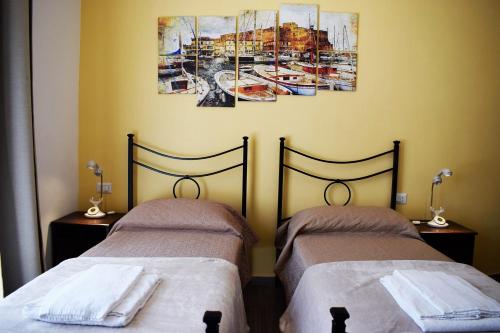 Postel nebo postele na pokoji v ubytování Neapolis Pie