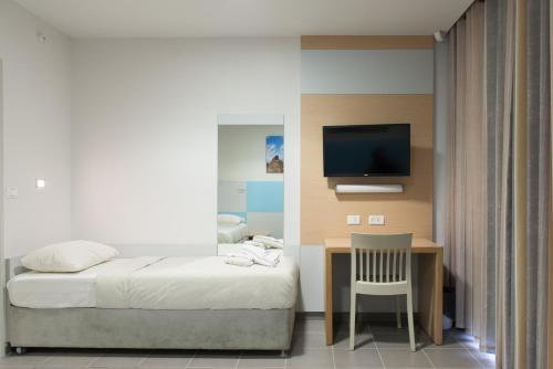 Un pat sau paturi într-o cameră la HI - Ein Gedi Hostel