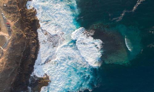 an aerial view of the ocean and a beach at Casa Playa Ondina in Gáldar