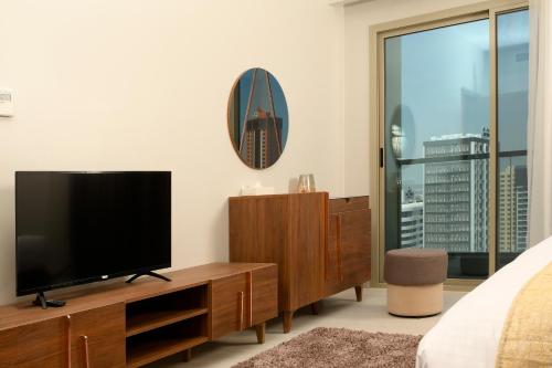 Μια τηλεόραση ή/και κέντρο ψυχαγωγίας στο BW Suites & Spa