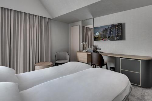 Postel nebo postele na pokoji v ubytování HOTEL GRANO Gdańsk Old Town - GRANO HOTEL Gdańsk Old Town
