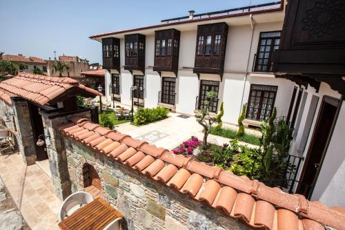 an overhead view of a building with a tile roof at Livia Garden Hotel in Selcuk