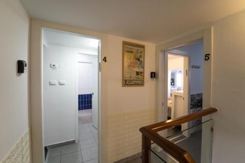 a hallway with a door leading to a bathroom at Eilot in Eilat