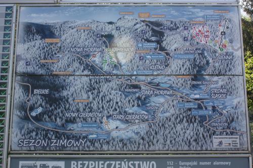 a sign with a map of a mountain at Czarna Góra Haven in Sienna