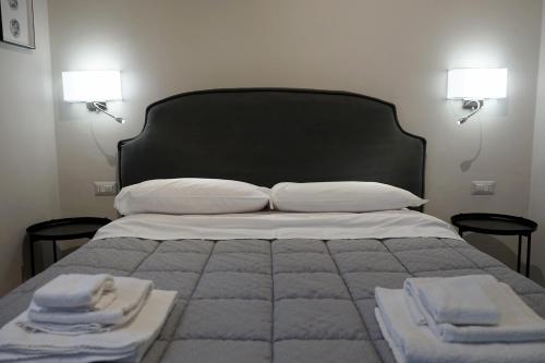 Letto o letti in una camera di Re di Smirne by Apulia Accommodation