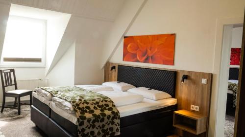 Voodi või voodid majutusasutuse Nierswalder Landhaus toas
