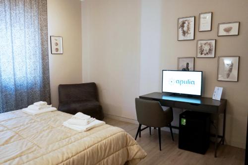 Letto o letti in una camera di Re di Smirne by Apulia Accommodation