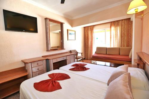 Postel nebo postele na pokoji v ubytování Hotel Manaus