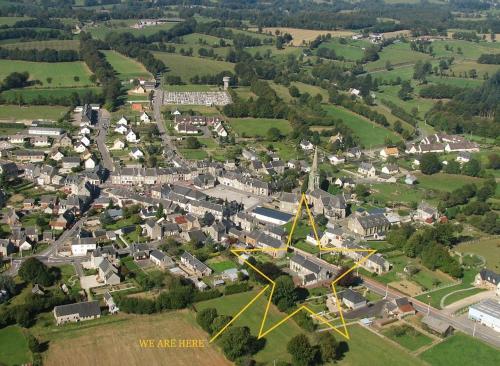 an aerial view of a small town with houses at Le Potier Jovial in Ger