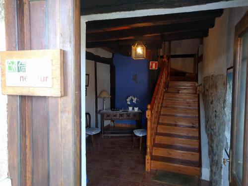 a hallway with a staircase in a house at Agroturismo Ondarre in Segura