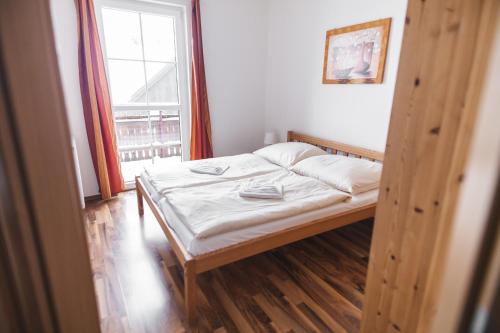 Postel nebo postele na pokoji v ubytování Apartmány Alpský Dům