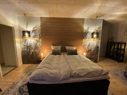 Кровать или кровати в номере Hotel Sov Godt Herning