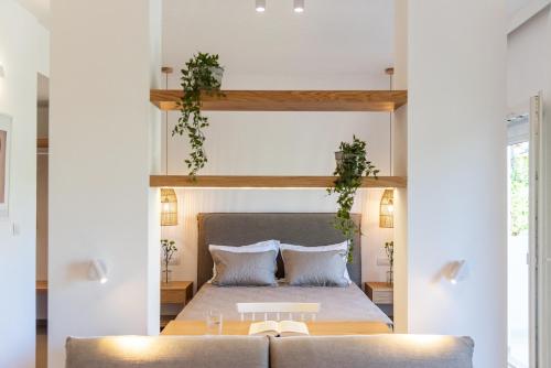 Postel nebo postele na pokoji v ubytování Christa Luxury Apartments