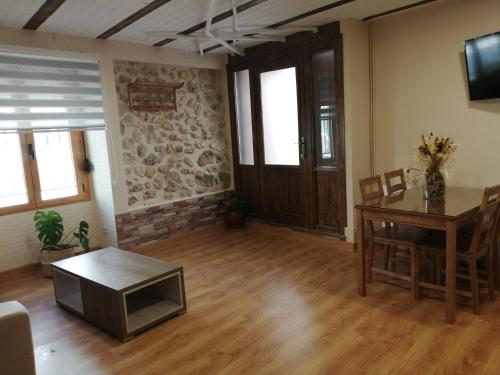 Televízia a/alebo spoločenská miestnosť v ubytovaní nueva tienda de felipe apartamento LA TIENDA