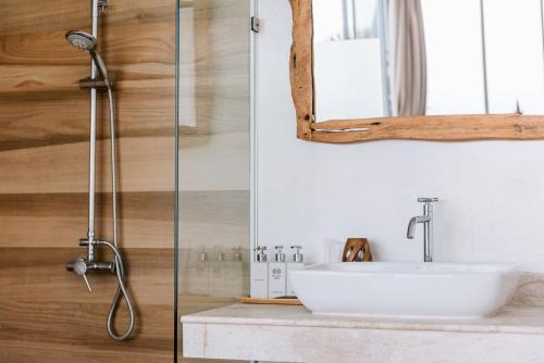 a bathroom with a sink and a shower at BelVillas-Award Winning SeaView Luxury Villas in Chaweng