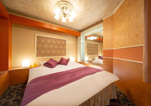 Katil atau katil-katil dalam bilik di HOTEL&SPA SIESTA ( Adult Only)