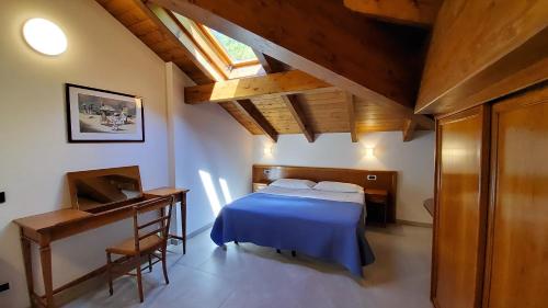 A bed or beds in a room at Residence L'Ulivo