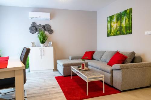 Χώρος καθιστικού στο Grey Suites Pécs