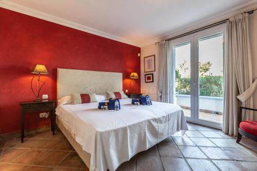 Postel nebo postele na pokoji v ubytování La Perla 1501