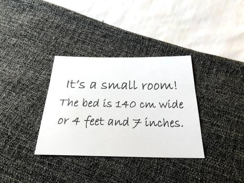 a handwritten note on a piece of paper on a table at Villa Frideborg in Henån