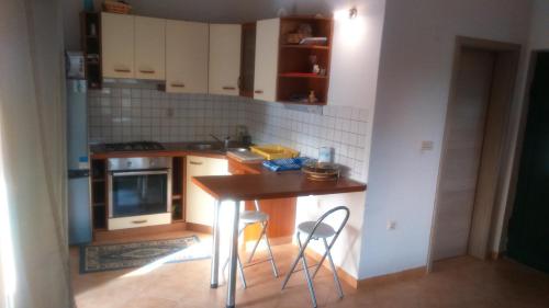 Kuchyň nebo kuchyňský kout v ubytování House Marko