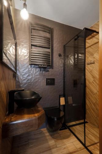 Ένα μπάνιο στο Willa Dream z basenem i jacuzzi 606-436-626