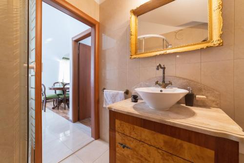 Kylpyhuone majoituspaikassa Apartments villa Mira