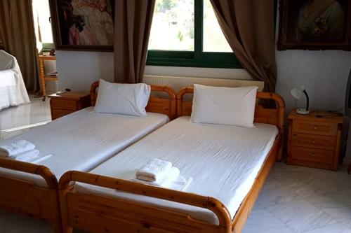 Ένα ή περισσότερα κρεβάτια σε δωμάτιο στο Seafront Maisonette in Kardamyli