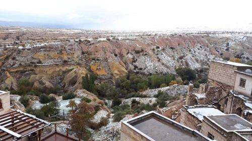 a view of the grand canyon in the winter at Pigeon Hotel Cappadocia in Uchisar