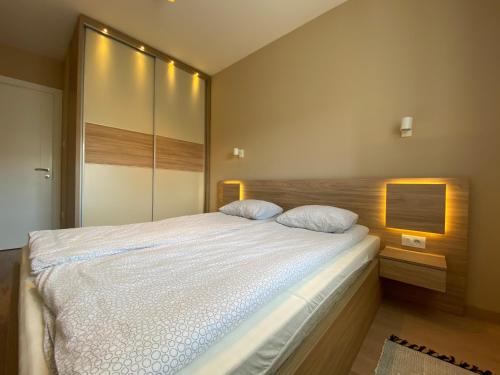 Postel nebo postele na pokoji v ubytování Premium Apartments