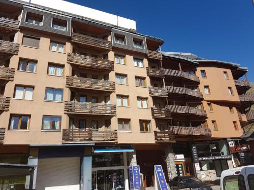 an apartment building with balconies on the side of it at Apartamentos Grifovacances Canigou in Pas de la Casa