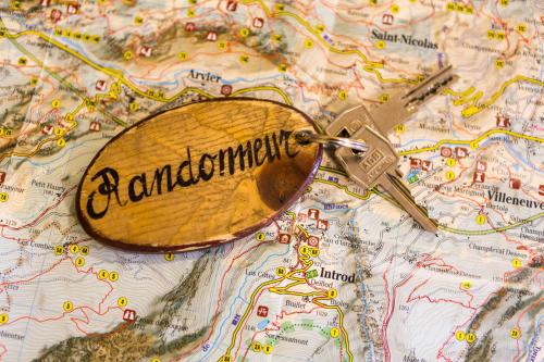 a wooden spoon on top of a map at Relais du Paradis Chambres d'Hôtes in Introd