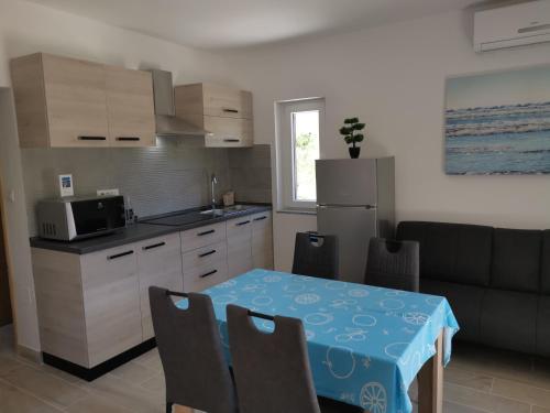 A kitchen or kitchenette at Apartments Jurandvor
