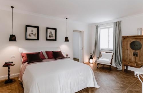 Postel nebo postele na pokoji v ubytování Borgo Piani - Camere di Charme