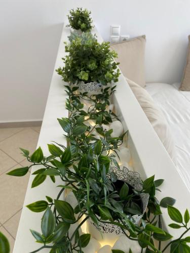 Ένα ή περισσότερα κρεβάτια σε δωμάτιο στο Overview Mykonos Apartments