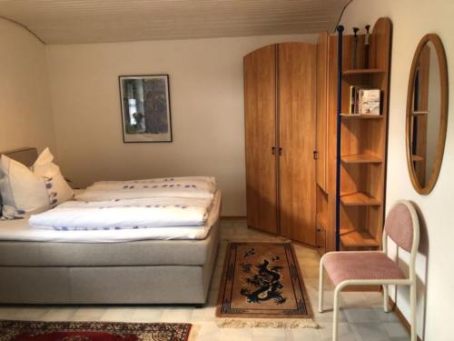 מיטה או מיטות בחדר ב-Hofmann Judith