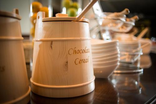 a cup with the word chocoat cereal on it sitting on a table at Hotel Phoenix in Zagreb