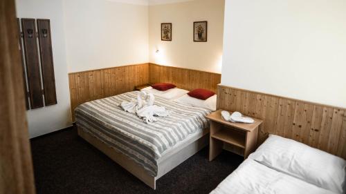 Кровать или кровати в номере Hotel Atlas