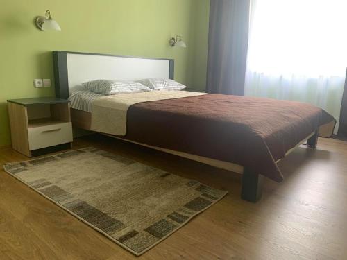 Postel nebo postele na pokoji v ubytování Апартаменти Monte