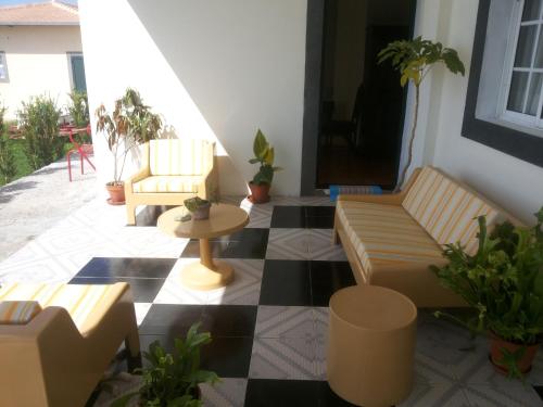 Ruang duduk di Quarto vista mar